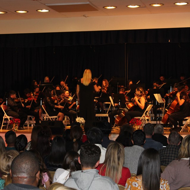 Our orchestra performs passionate pieces for the community. Great job scholars!