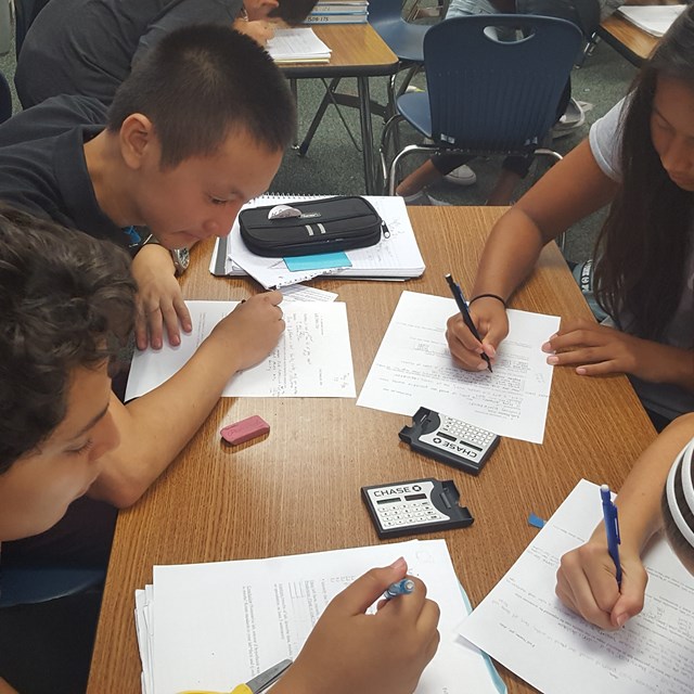 Students engage in their density lab. Time to embrace the sciences!