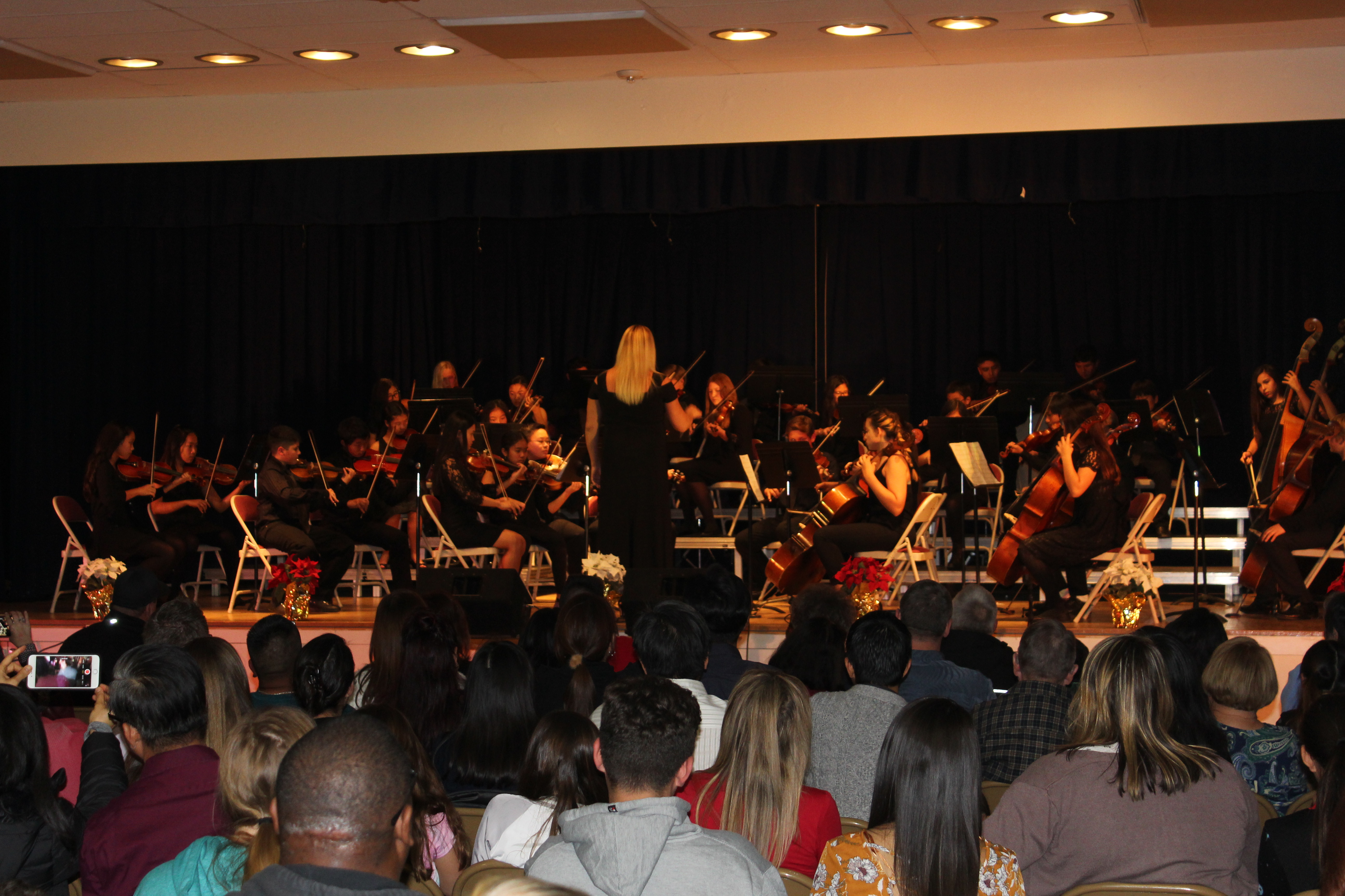 Our orchestra performs passionate pieces for the community. Great job scholars!