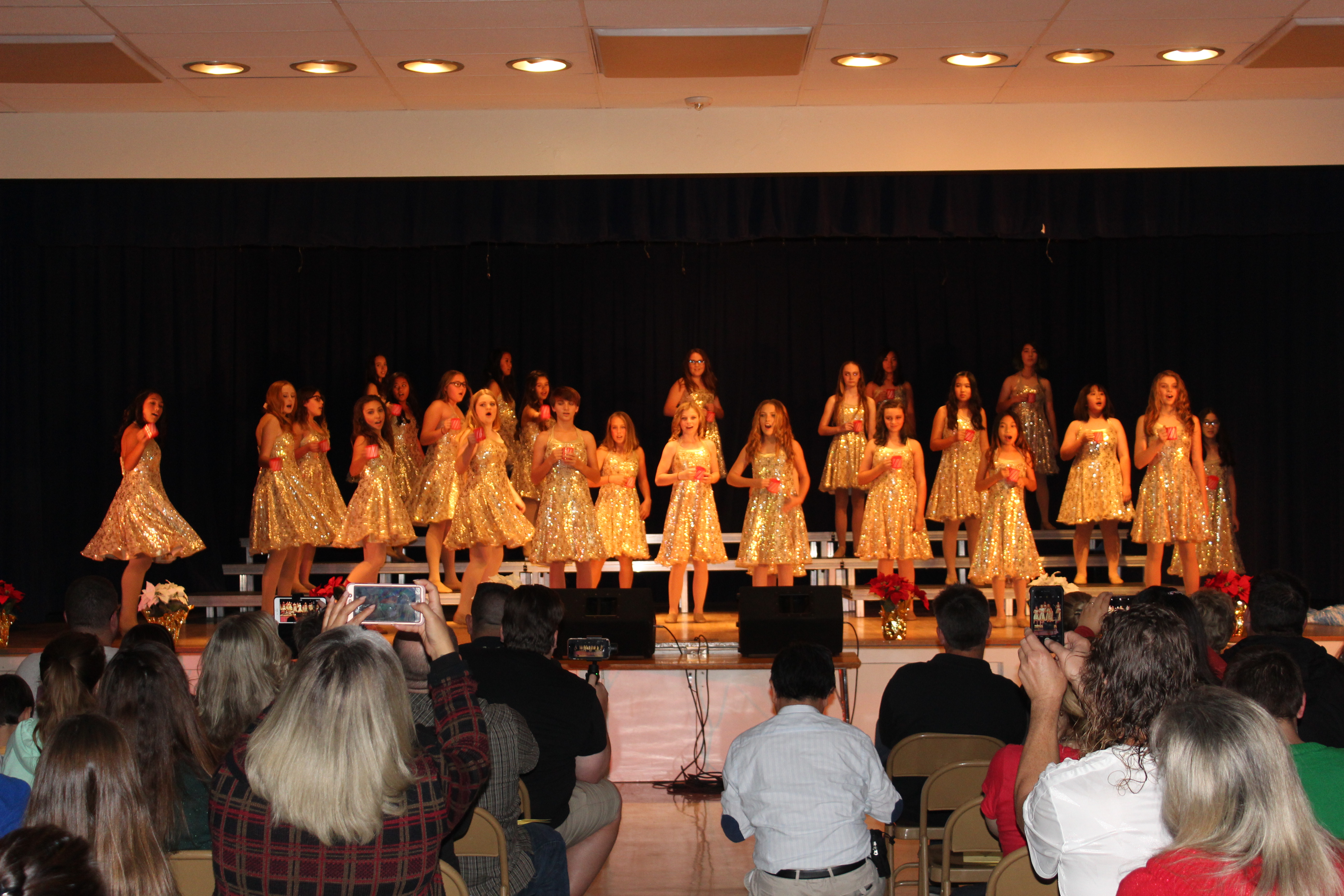 Bell's choir ladies perform a heartfelt medley of songs in their sparkly attire.