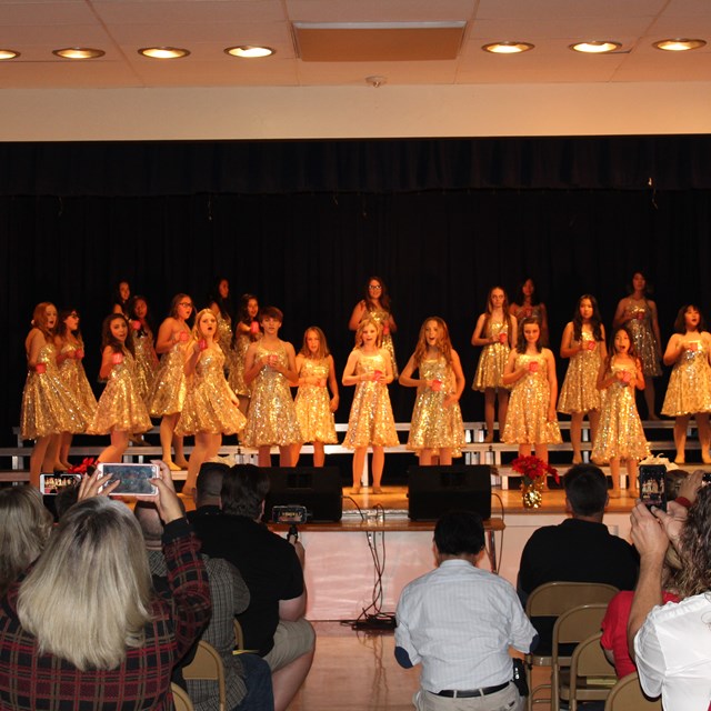 Bell's choir ladies perform a heartfelt medley of songs in their sparkly attire.